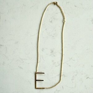 Anthropologie Gold 'E' Necklace
